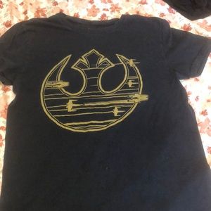 A black StarWars T-shirt soft with A boat anchor!